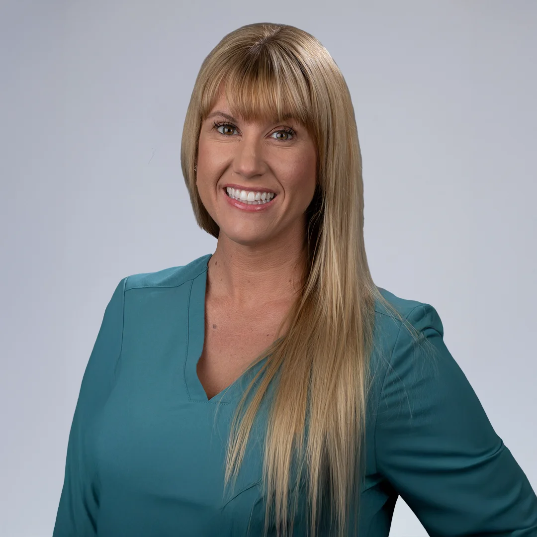Woman with long blonde hair.