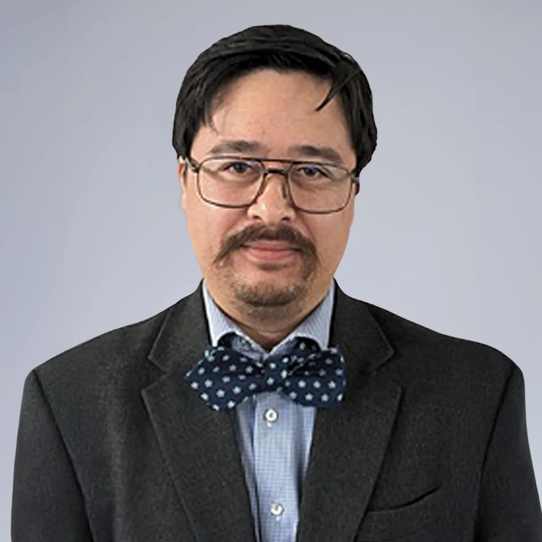Man in suit with bow tie.