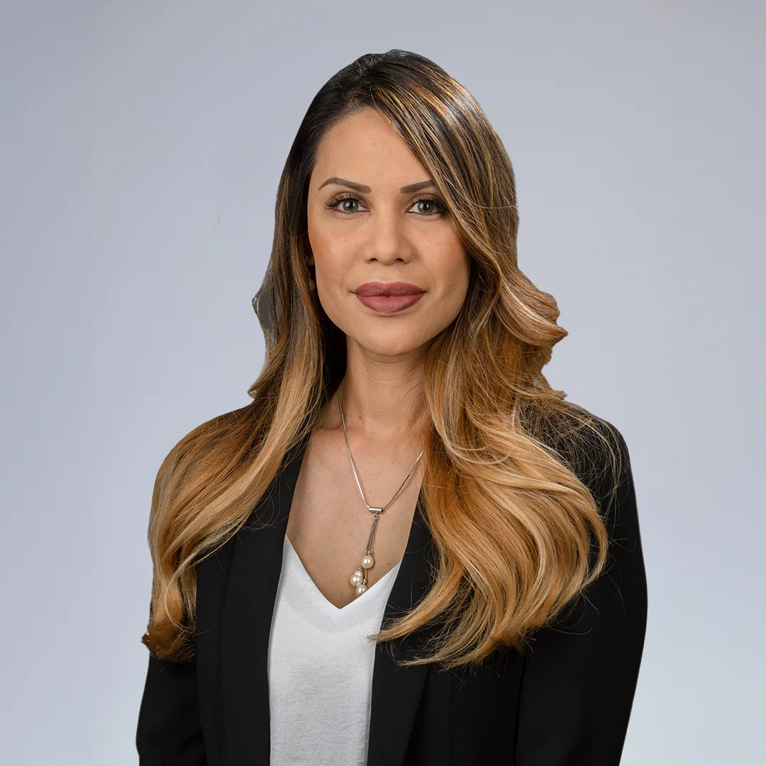 Woman with long, wavy hair.