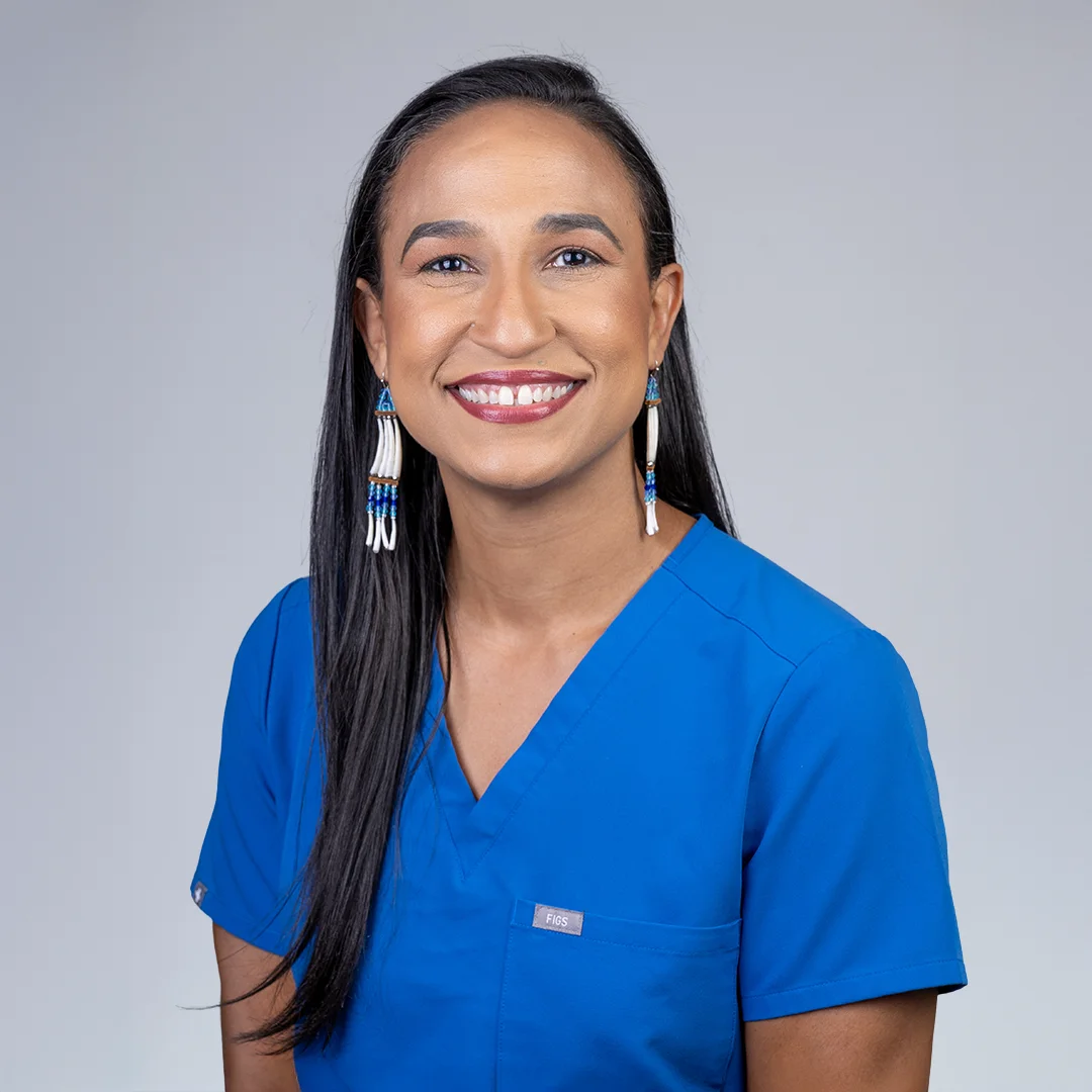 Person in blue medical scrubs.